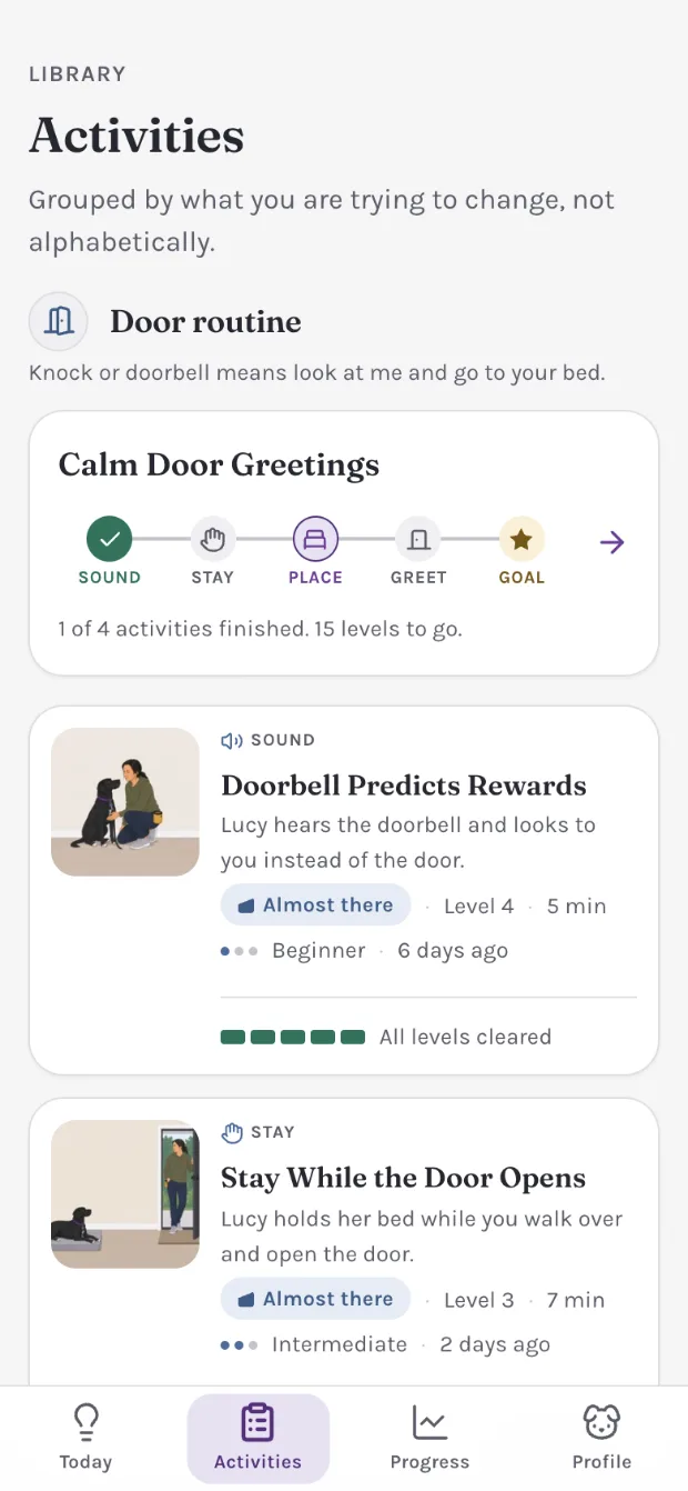 The Activities library, grouped by what you are trying to change: the Calm Door Greetings track with five stations, and activity cards for Doorbell Predicts Rewards and Stay While the Door Opens, each carrying its level and last practice.